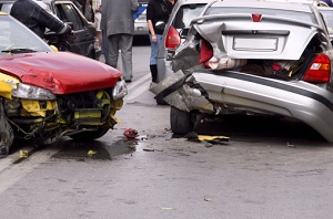 red and silver cars that have been in an accident