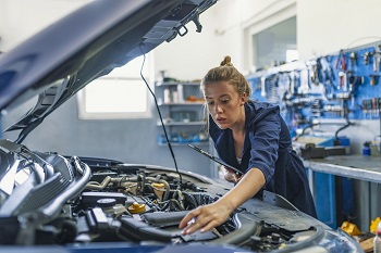 Female Mechanic At Work