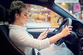 Woman Texting And Driving